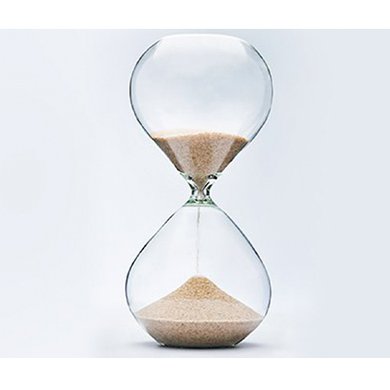 Eine Sanduhr, zur Hälfte abgelaufen