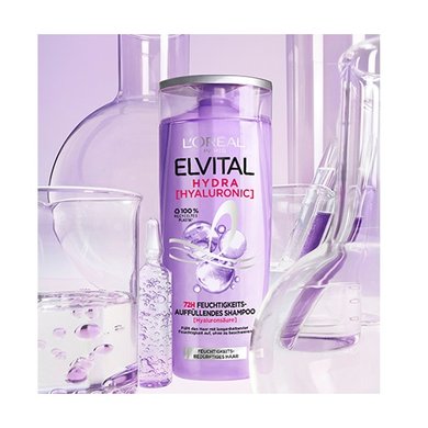 Elvital Hydra Shampoo zwischen Laborgläsern