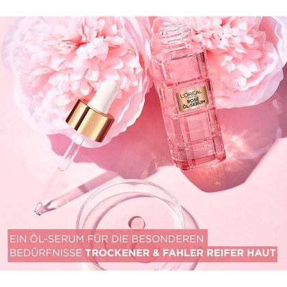 Golden Age Rosé Öl-Serum Produktbild mit Rosenblüten im Hintergrund