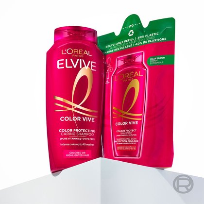 Color-Vive Shampoo - Produktabbildung normale packung & Nachfüllpack auf einem hellgrauen Sockel